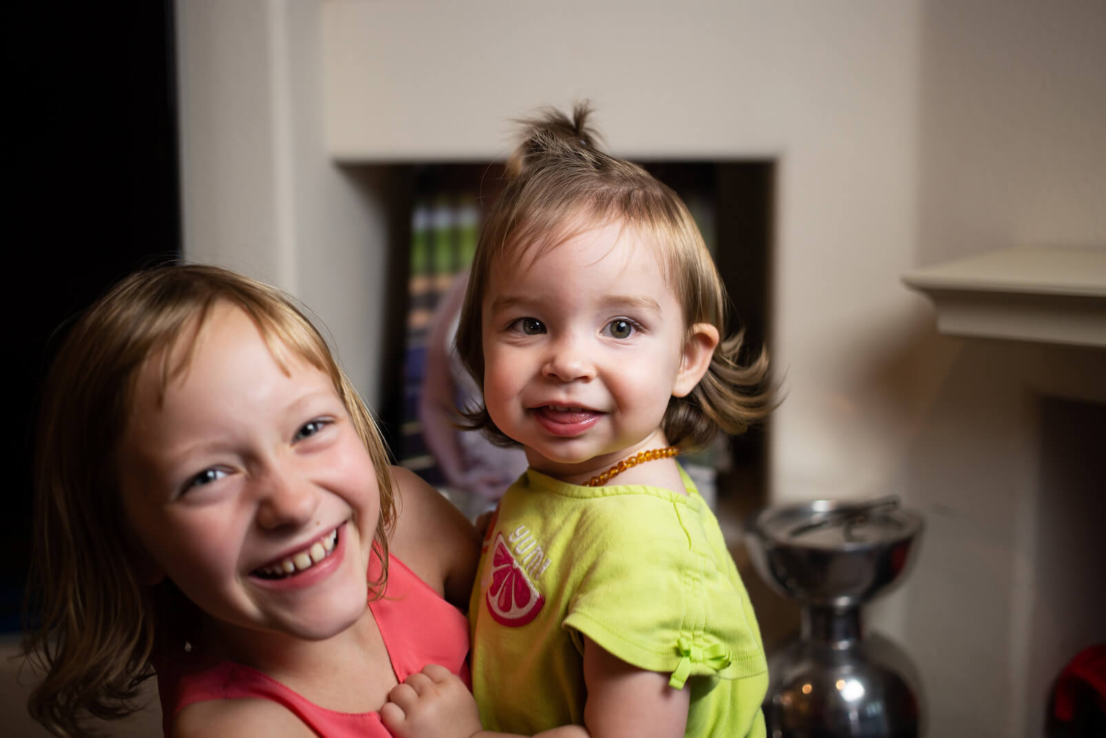 Two happy children smile for the camera; a classical math community inspires joy and fellowship.