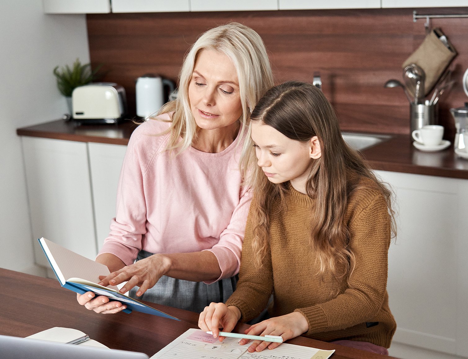 teen-child-daughter-studying-at-home-in-kitchen-wi-2021-09-02-14-46-46-utc_croppedLR